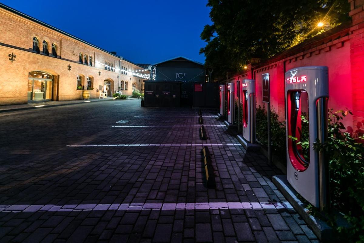 City Park Hotel & Residence Poznań Kültér fotó Tesla Supercharger in Warsaw, Poland